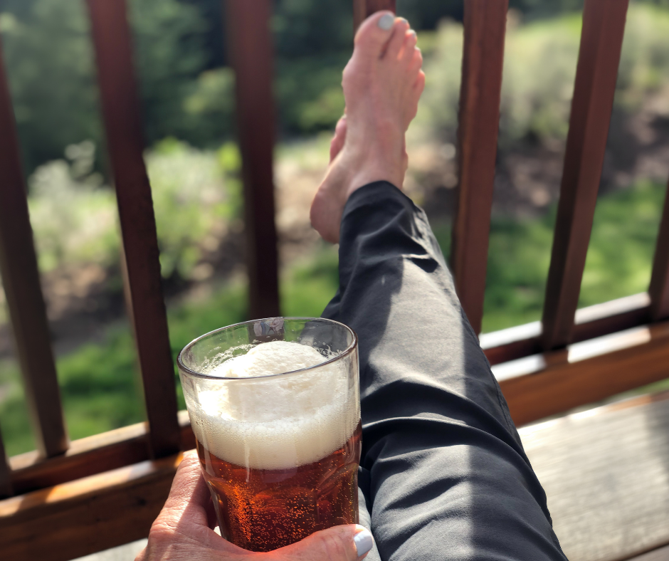 drinking a beer with feet up